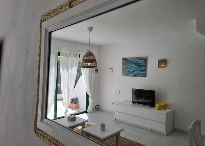 La Casa De Palomitas Коральео