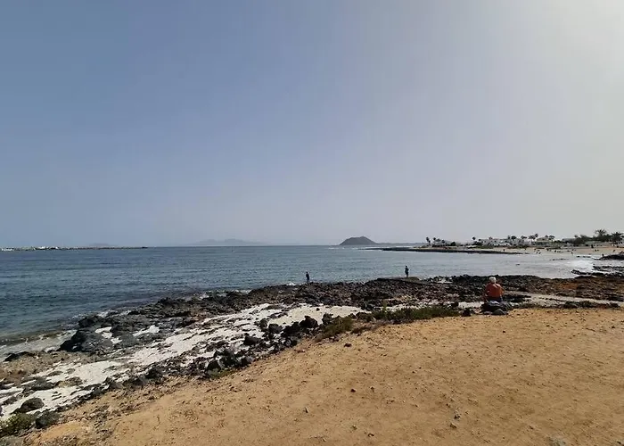 La Casa De Palomitas Апартаменты Коральео