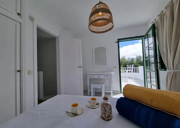 La Casa De Palomitas Коральео